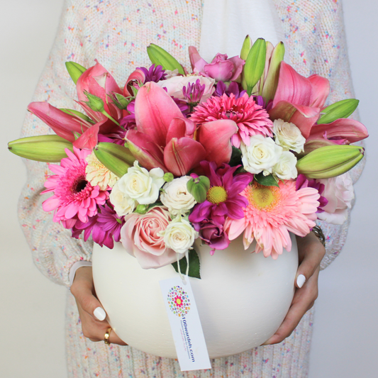 White Pot with Pink and Purple Flowers